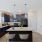 a kitchen with a marble island