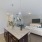 a kitchen and living room