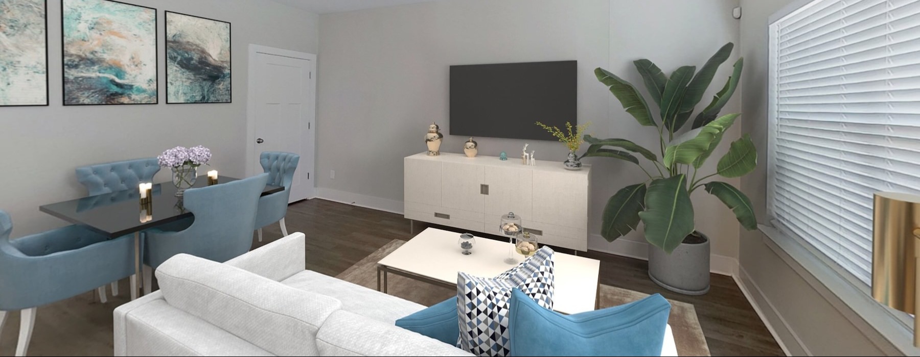 a living room with a tv and couches