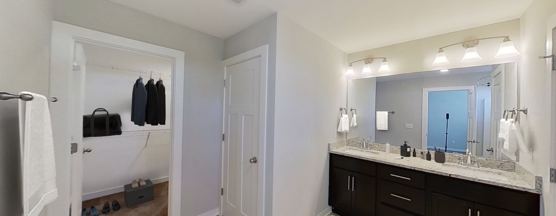 a bathroom with a large mirror