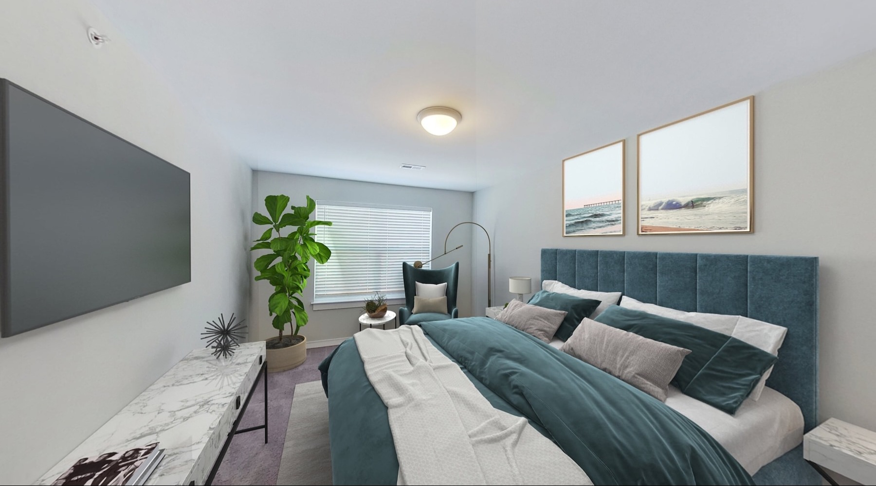 a bedroom with a bed and a tv