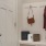 an entry area with hooks and a show holder