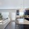 a kitchen with a dining table and couches